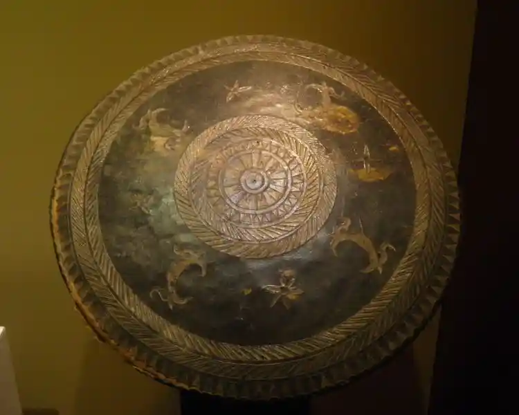 Shield, solar disc in the center, sun symbol, inscriptions